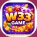 W33 Game mobile app logo featuring bold golden 'W33' text with purple outline, surrounded by gaming elements like dice, playing cards, coins, a spinning wheel, and a trophy, on a vibrant purple and blue background with sparkles